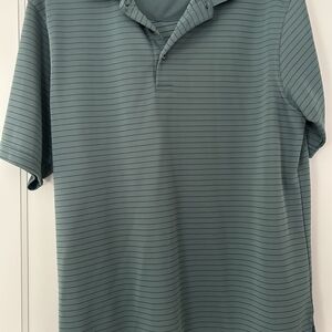 Grand Slam Green Polo Shirt with Subtle Stripes
